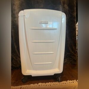 White Samsonite carry-on bag